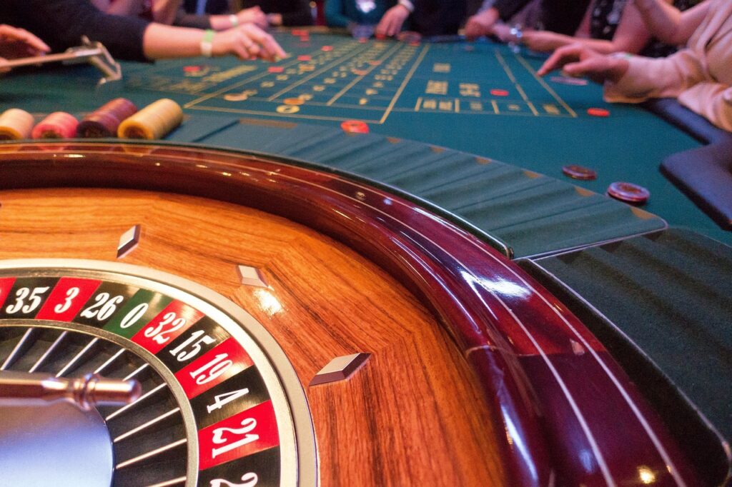 Live dealer at roulette casino table